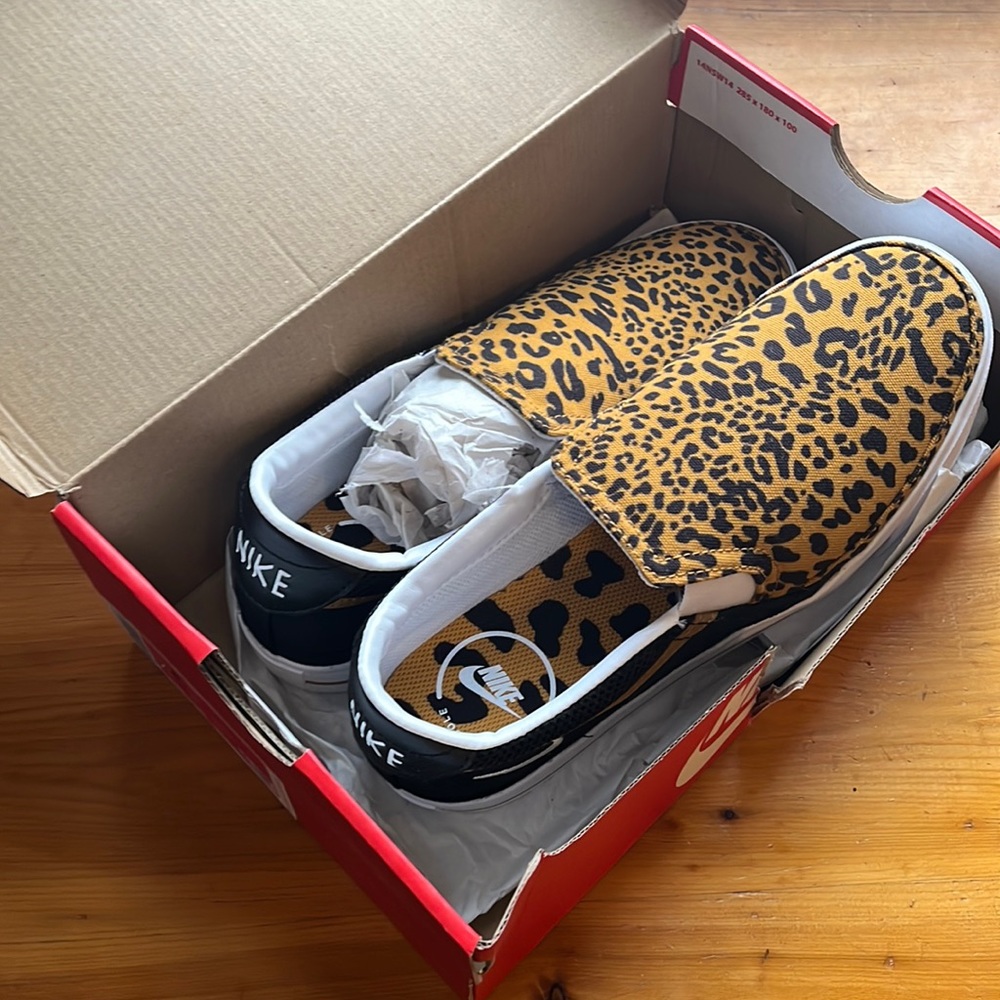 Woman’s NIKE size 7.5 leopard slip ons